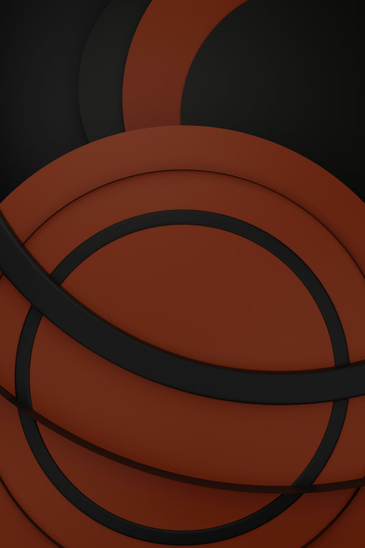 a close up of a bunch of basketballs on a black background